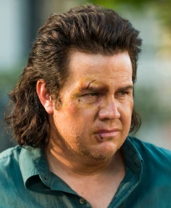 Visage d'Eugene dans la série The Walking Dead
